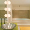 applique dioscuri 25 en verre soufflé blanc mise en scène artemide
