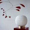 Lampe à poser Gem tavolo Foscarini Valente Design Ludovica et Roberto Palomba mise en scène