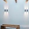 Applique Clessidra Outdoor 40° marron mise en situation  de Flos - Valente Design