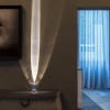 Lampe à poser Atman Catellani And Smith Valente Design mise en scène reflet lumineux