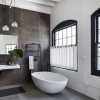 La salle de bain aménagée avec une baignoire Spoon XL de la marque Agape - Valente Design