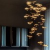 Suspension Gold Moon Chandelier or Catellani and Smith Valente Design allumée mise en scène salon