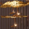 Suspension Gold Moon Chandelier Catellani and Smith Valente Design  détail feuille d'or éclairé