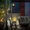 Lampe à poser Medouse F verre irrégulier vert Catellani and Smith Valente Design sur terrasse