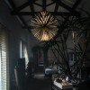 Suspension Sun Light of Love or mat Foscarini Valente Design dans salon