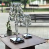 Lampes avec fil Big Battery et Battery cristal Kartell Valente Design sur table