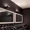 Applique Fort Knox Wall chrome poli Flos Valente Design dans salle de sport