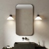 Applique Conic noir mat Astro Lighting Valente Design dans salle de bain