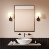 Applique Millie noir mat Astro Lighting Valente Design dans salle de bain
