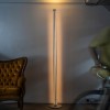 Lampadaire Chiaroscura titane Foscarini Valente Design éclairé - dans salon