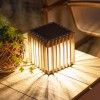 Lampe solaire de table VERTI Les Jardins - Valente Design éclairée sur table basse