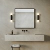 Applique Ortona Twin noir mat Astro Lighting Valente Design allumée dans salle de bain