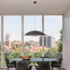 Suspension Neutra noir Kartell - Valente Design - mise en scène salle à manger