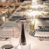 Lampe sans fil Space outdoor de Kartell mise en scène table - Valente Design
