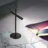Lampe de table Magneto noir Foscarini - Valente Design sur table basse