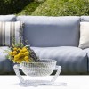 Centre de table U SHINE cristal Kartell - Valente Design sur table basse extérieure