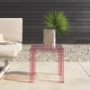 Table basse JOLLY rose Kartell - Valente Design - sur terrasse avec pot de fleur