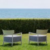 Fauteuil CARA OUTDOOR IVOIRE/FIBRE TEINTÉE BLEU Kartell - Valente Design - dans jardin