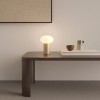 Lampe Zeppo Portable bronze clair Astro Lighting - Valente Design - éclairée sur table