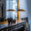 Lampe de table Chapeaux M ocre Foscarini  - Valente Design - éclairée sur cheminée