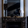 Lampe de table Chapeaux V blanc chaud Foscarini  - Valente Design - éteinte sur cheminée