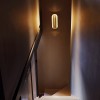 Applique Rosalie allumée dans un escalier - DCWÉditions