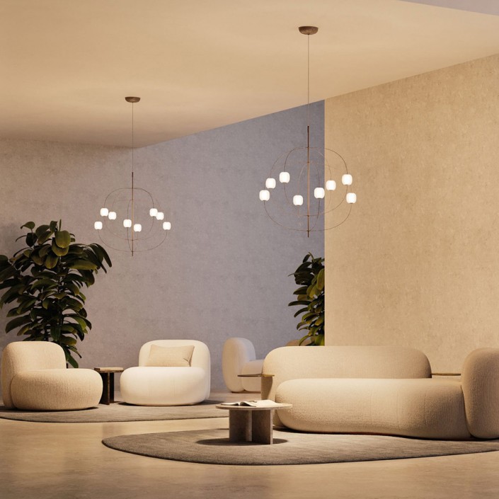 Deux suspensions Axia glossy bronze dans un intérieur au-dessus de canapés et de fauteuils - Lodes - Valentedesign.com