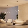 Deux suspensions Axia glossy bronze dans un intérieur au-dessus de canapés et de fauteuils - Lodes - Valentedesign.com