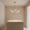 Suspension Axia glossy bronze au-dessus d'une table en intérieur - Lodes - Valentedesign.com