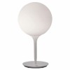 Lampe de table Castore 25  mise en scène éclairage  Artemide 