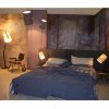 Lampe de table Fork structure anthracite abat-jour ivoire Diesel Living Lodes Valente Design dans chambre