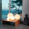 table dioscuri 14 mise en scène éclairé Artemide 