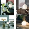 dioscuri design 14  mise en scène éclairé Artemide 